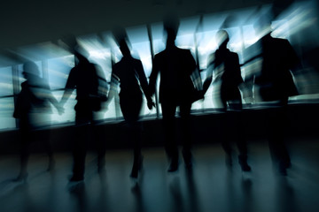 Blurred motion of business people
