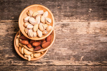 Mix nuts on wooden table,healthy vegan food.