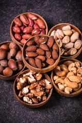Mix nuts on wooden table,healthy vegan food.