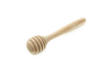 wooden honey dipper isolated on white background.