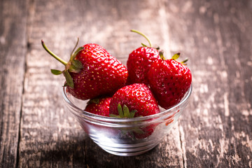 Fresh strawberry on wooden table healthy food
