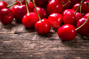 Fresh cherry on wooden table healthy food