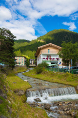 Fototapeta na wymiar mountain river flowing through village