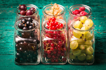 Fresh summer berries , wooden background, healthy food.
