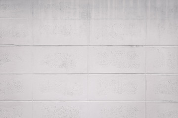 Naklejka premium Concrete block wall seamless background and texture