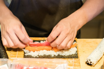 Chef Preparing Sushi
