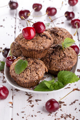Fototapeta na wymiar Chocolate muffins with sugar crust