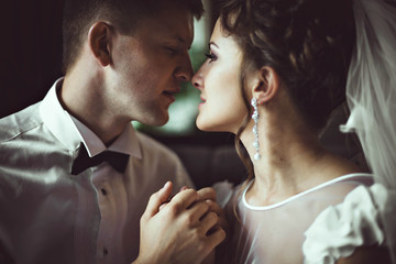 happy man kissing his beloved wife