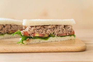 tuna sandwich on wood