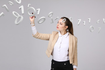 Woman working with binary code, concept of digital technology.