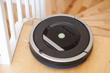 robotic vacuum cleaner on laminate wood floor smart cleaning tec