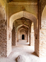 The historical ruins of the now famous Bhangarh Fort with ruins of temples, shops, gates and ramparts in the Rajgarh municipality of the Alwar district in the state of Rajasthan in India 