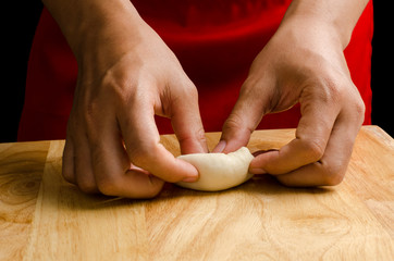 Obraz na płótnie Canvas Bun cooking (kneading dough)