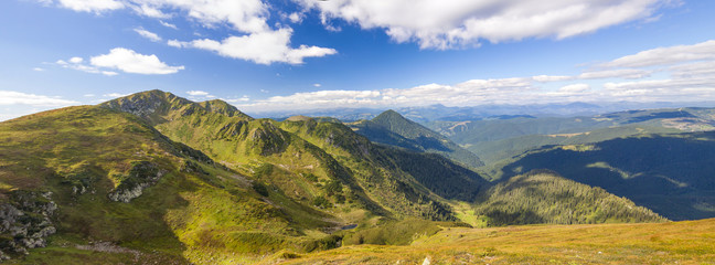 Panorama of Carpathian mountains in summer sunny day