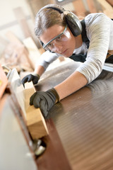 Young woman in crafstmanship school, training course