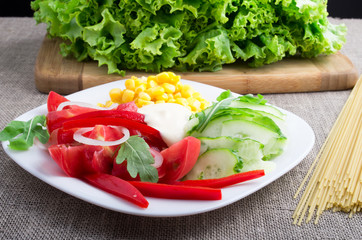 Healthy vegetarian dish on a gray textured fabric