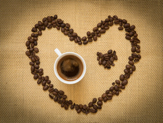 Fresh black coffee and beans