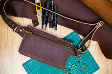 Genuine brown leather beltbag, hand bag or waist bag is hipster