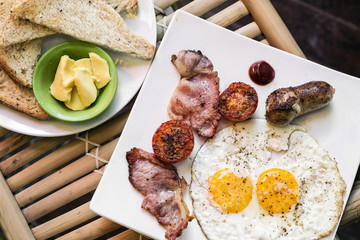 traditional english british fried breakfast with eggs bacon and - Powered by Adobe