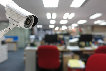 CCTV Camera security operating in office building.
