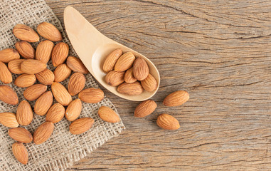 almonds, almonds on wood spoon, almonds background