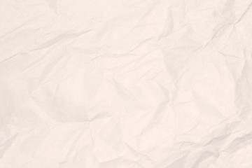 Recycled crumpled light brown paper texture or paper background for design with copy space for text or image.