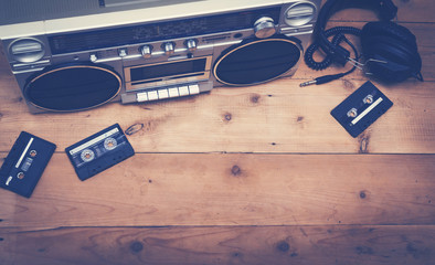 retro stereo set with cassette tapes and headset - obrazy, fototapety, plakaty