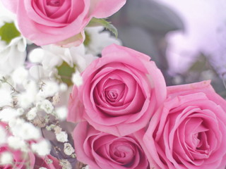 Bouquet of beautiful flowers as a background. Selective focus on pink roses.