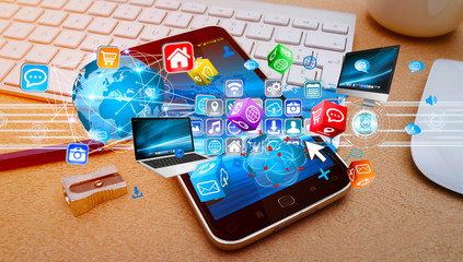 Tech devices connected to each other by mobile phone © sdecoret