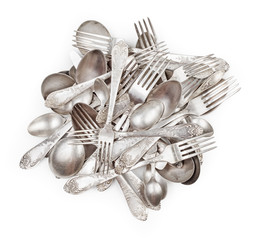 Pile of aged vintage silver cutlery