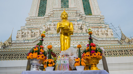 Buddha gold statue and thai art architecture in Wat Arun buddhist temple in Bangkok, Thailand.Selective focus.