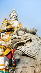The beautiful of  stone Thai-Chinese style sculpture and thai art architecture in Wat Arun buddhist temple in Bangkok, Thailand/Selective focus.