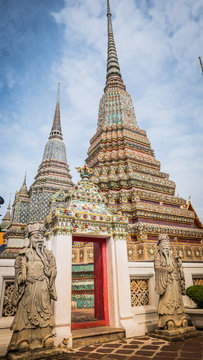 The beautiful of  stone Thai - Chinese style sculpture and thai art architecture  in Wat Phra Chetupon Vimolmangklararm (Wat Pho) temple in Thailand.
