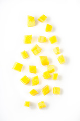 Fototapeta na wymiar Mango slice cut to cubes isolated on white background. Top view.