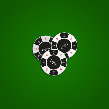Set of casino chips isolated on green background.
