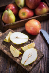 Sliced ripe autumn pear and apple