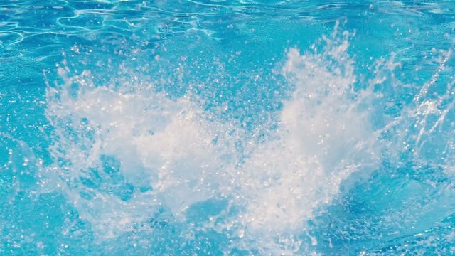 Man jumping in the swimming pool