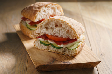 italian sandwich with speck and mozzarella