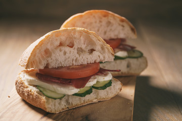 italian sandwich with speck and mozzarella