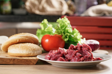 ingredients for burger on kitchen table