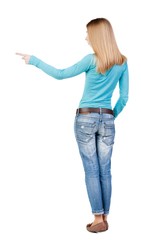 Back view of  pointing woman. beautiful girl. Rear view people collection.  backside view of person.  Isolated over white background.