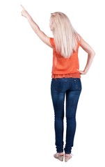 Back view of  pointing woman. beautiful blonde girl in jeans.  Rear view people collection.  backside view of person.  Isolated over white background.