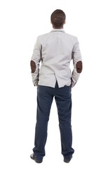 back view of Business man  looks.  Rear view people collection.  backside view of person.  Isolated over white background.  Sad man looking upward with his hands in his pockets.