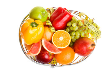 tasty summer fruits in backet isolated on white