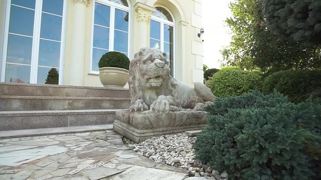 Cinematic Lion Sculpture Slider Shot.