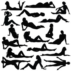 Silhouette of beautiful woman in bikini sitting and laying.