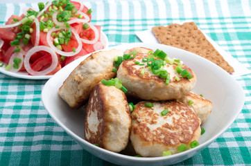 Meatballs minced chicken and tomato salad