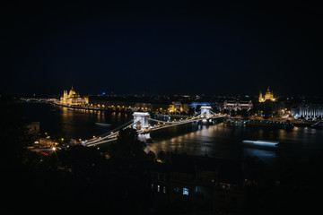 Fototapeta na wymiar Night cityscape of Budabest, capital of Hungary. Chain Bridge nicely illuminated.