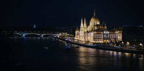 Fototapeta na wymiar Night view of parliament building, symbol of Budapest