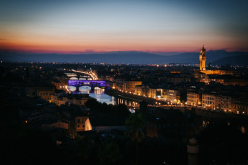 Fototapeta na wymiar Florence evening sunset cityscape skyline with ponte Vecchio view